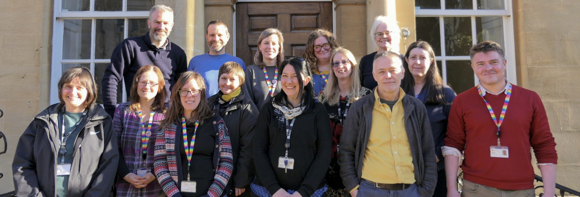 A group of subject librarians standing outside a university building